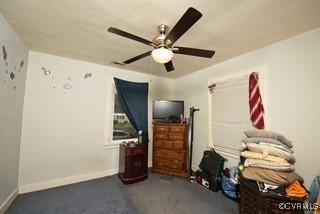 bedroom with baseboards and ceiling fan