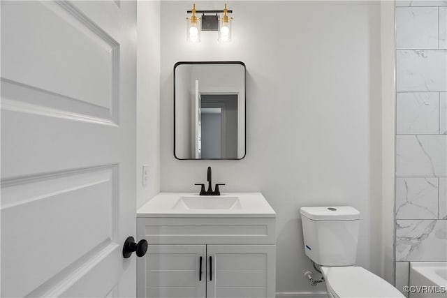 full bathroom with vanity and toilet