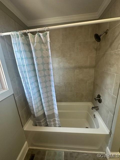 full bathroom with crown molding and shower / bath combination with curtain