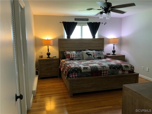 bedroom featuring wood finished floors