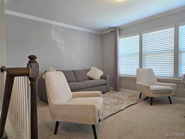 living room with crown molding, carpet, baseboards, and visible vents