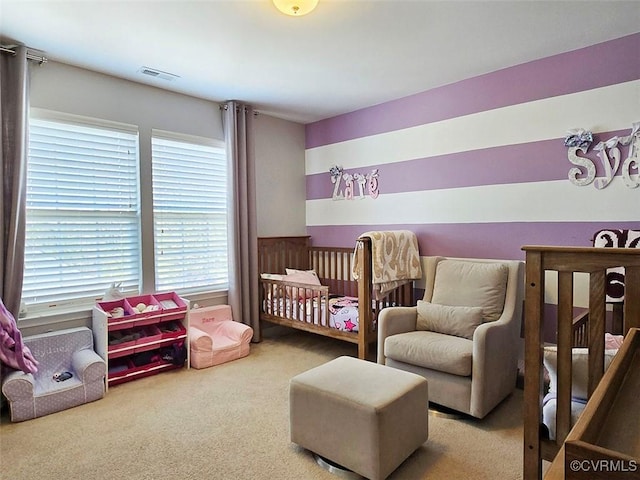 carpeted bedroom with visible vents