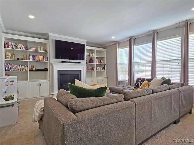 living area with light carpet, recessed lighting, a fireplace, and ornamental molding