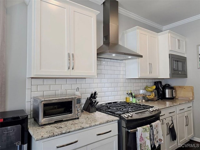 kitchen with stainless steel gas range oven, black microwave, crown molding, and wall chimney range hood