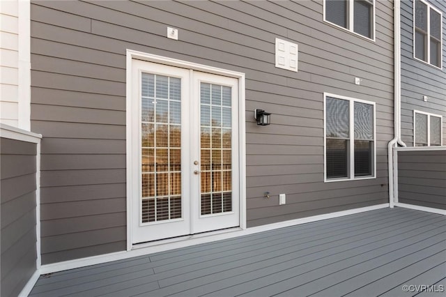 wooden terrace featuring french doors