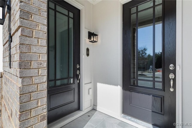 view of exterior entry with stone siding