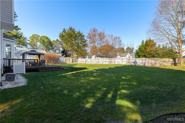 view of yard featuring a gazebo and fence