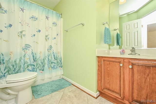 full bath with tile patterned floors, shower / bath combo with shower curtain, toilet, baseboards, and vanity