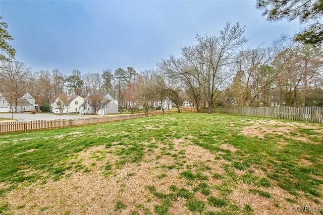 view of yard featuring fence