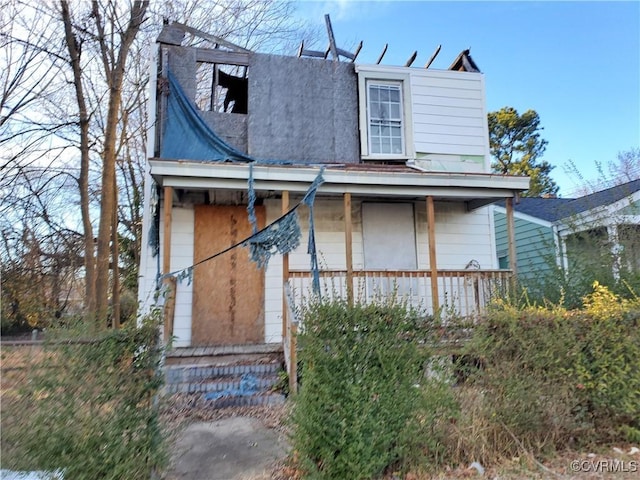 view of front of home featuring covered porch