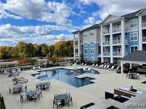 community pool with a patio