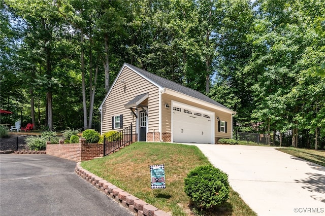 garage featuring driveway