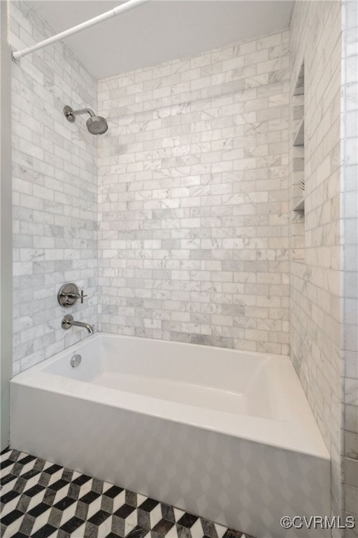 full bath featuring shower / tub combination