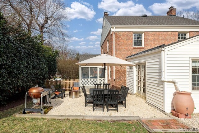 view of patio / terrace with french doors and fence