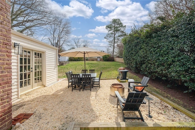 view of patio / terrace featuring french doors and outdoor dining area