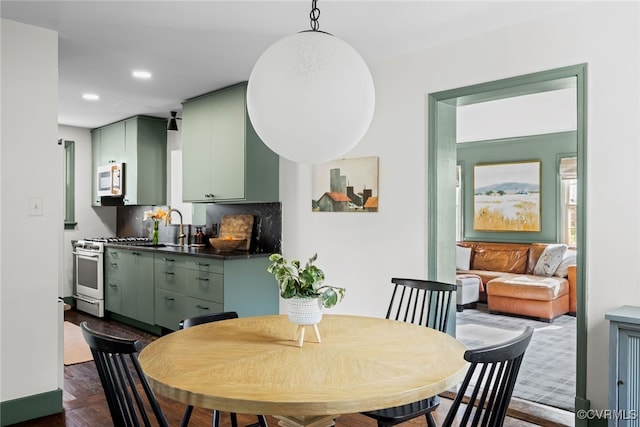 dining area with recessed lighting