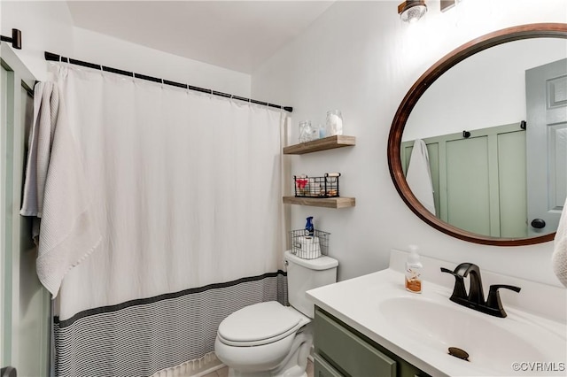 full bath featuring curtained shower, toilet, and vanity