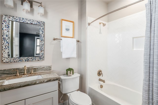 full bathroom featuring vanity, toilet, and shower / tub combo