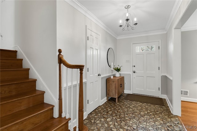 entrance foyer featuring visible vents, stairway, crown molding, and baseboards