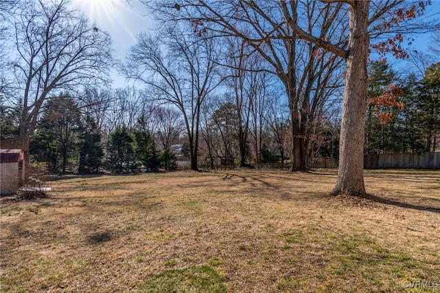 view of yard with fence