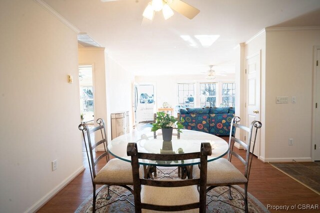 560 Skipjack Dr, Heathsville, VA 22473 - dining area featuring ceiling fan, healthy amount of natural light, ornamental molding, wood finished floors, and baseboards