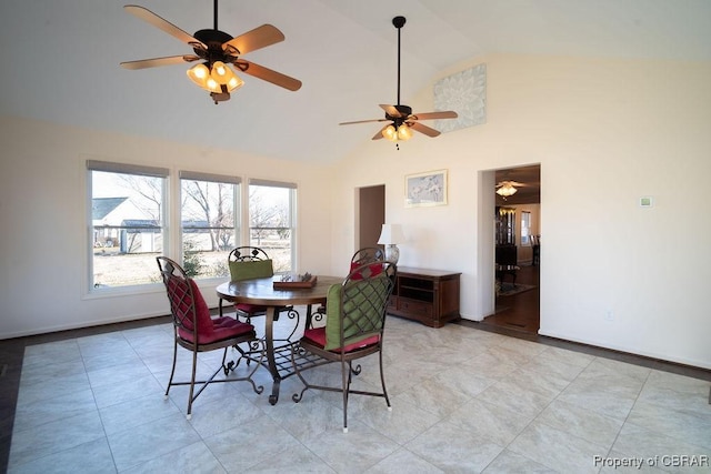 560 Skipjack Dr, Heathsville, VA 22473 - dining area featuring a ceiling fan, high vaulted ceiling, and baseboards