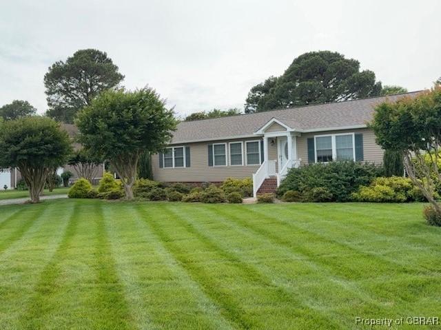 560 Skipjack Dr, Heathsville, VA 22473 - ranch-style house with a front lawn