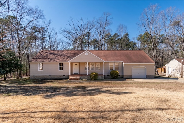 view of front of house featuring a garage, a porch, dirt driveway, a front yard, and crawl space