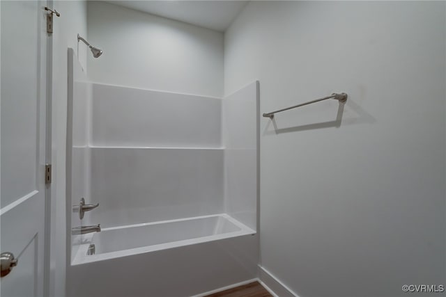 bathroom with washtub / shower combination