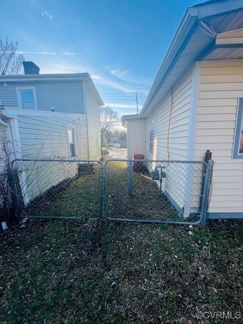 view of yard with a gate and fence