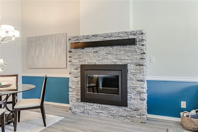 details with wood finished floors and baseboards