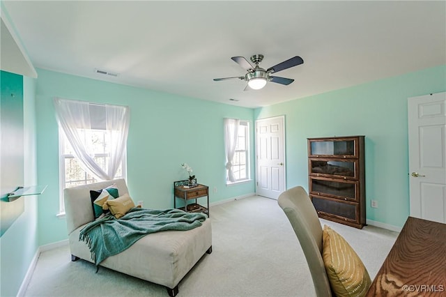 bedroom featuring visible vents, baseboards, and carpet flooring