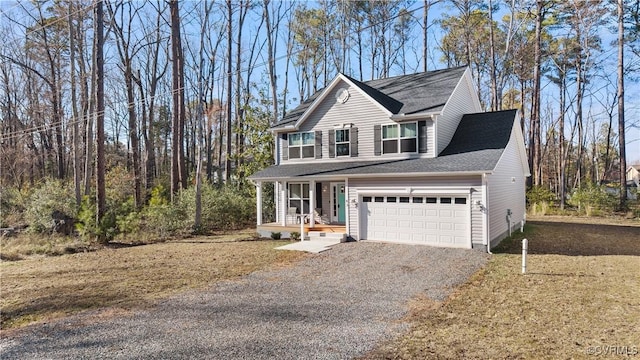 view of front of house with a porch, an attached garage, gravel driveway, and roof with shingles