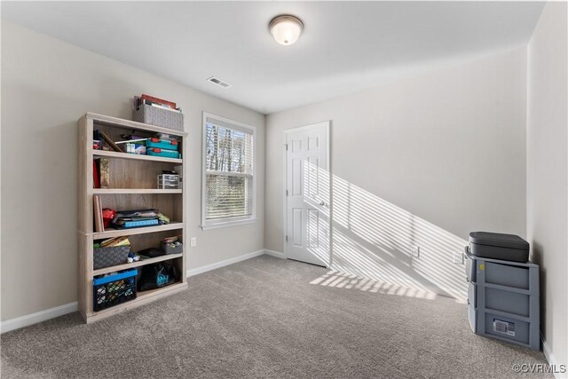 interior space featuring visible vents and baseboards