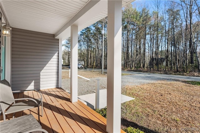 wooden terrace with covered porch