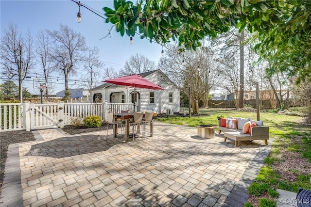 view of patio featuring a gate and a fenced backyard