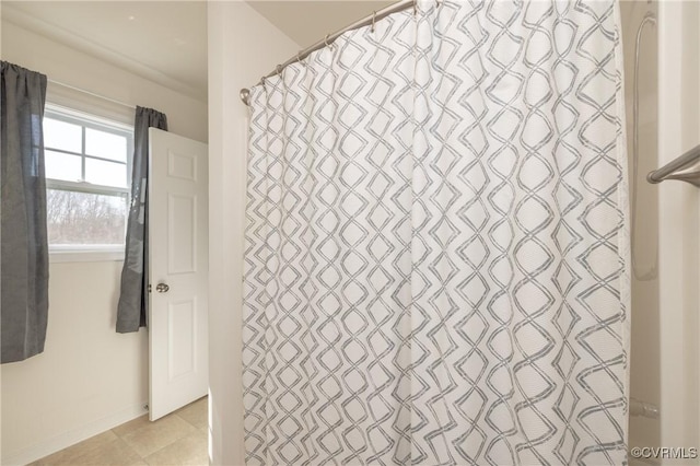 full bathroom featuring tile patterned flooring