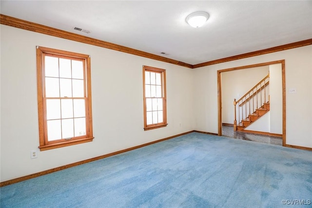 spare room featuring stairs, baseboards, carpet floors, and ornamental molding