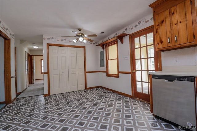 interior space featuring visible vents, brown cabinets, stainless steel dishwasher, light countertops, and baseboards