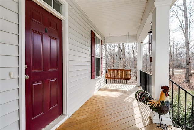 wooden deck with a porch