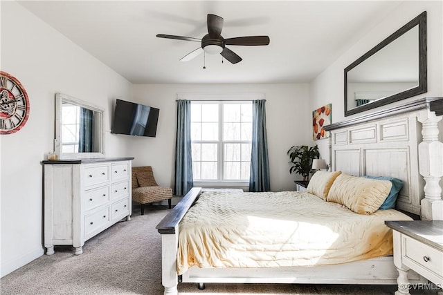 bedroom with light carpet and a ceiling fan