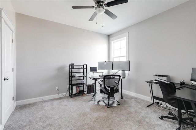 office area featuring baseboards, ceiling fan, and carpet floors