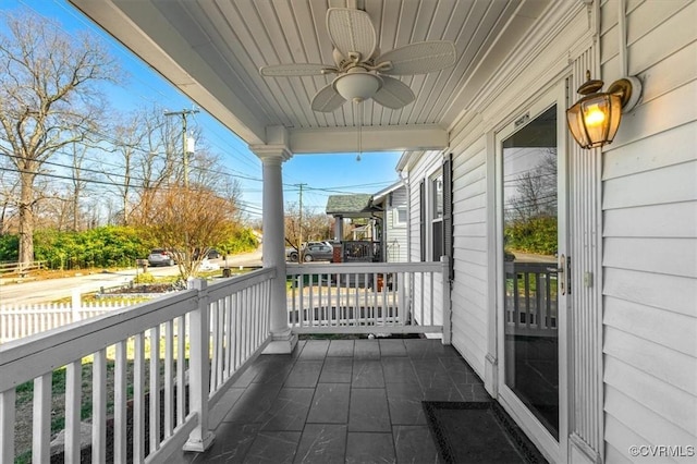 balcony featuring ceiling fan