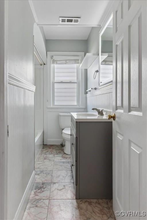 bathroom with visible vents, marble finish floor, vanity, and toilet