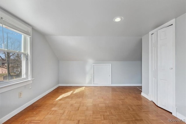 bonus room featuring recessed lighting, baseboards, and vaulted ceiling