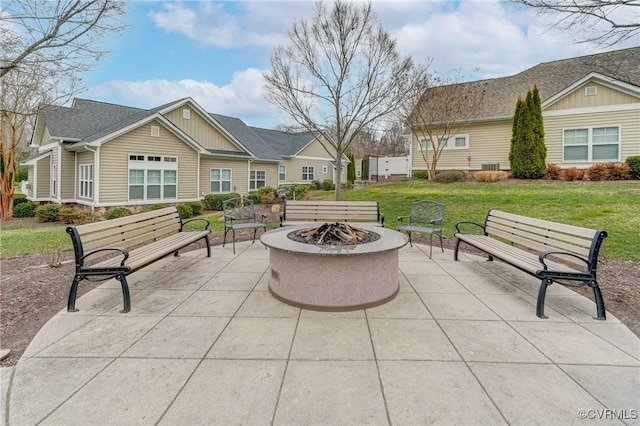 view of patio with a fire pit