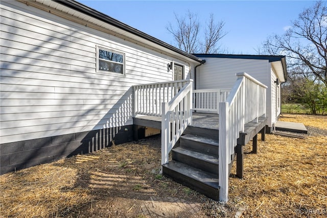 exterior space featuring a wooden deck