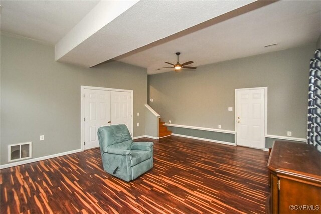 unfurnished room featuring visible vents, a ceiling fan, baseboards, and wood finished floors