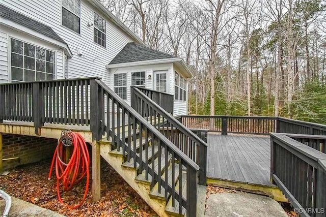 wooden terrace featuring stairs