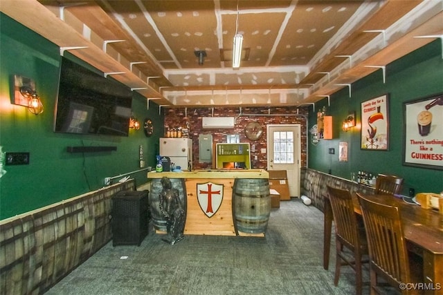 interior space featuring a workshop area and electric panel